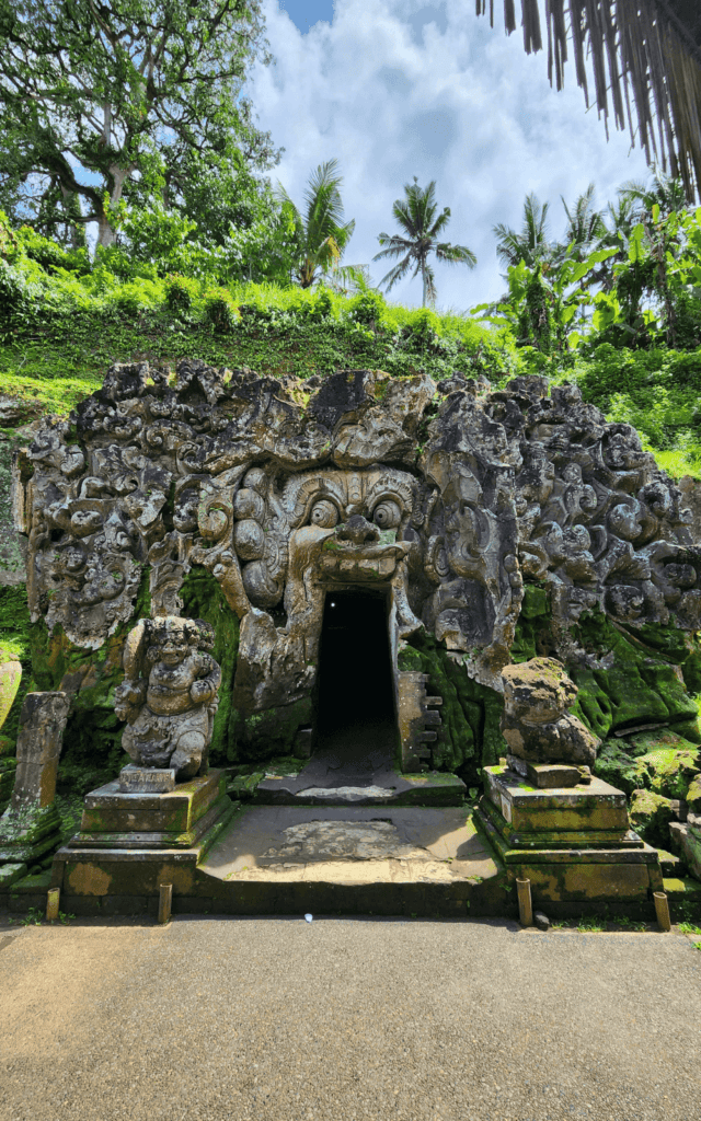 Elephant Cave: visitors enter the site from the demon's mouth. This site is one of the best things to do in Ubud bali