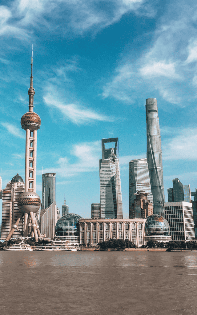 Pudong side of the river during the day. It's the most modern district in Shanghai.